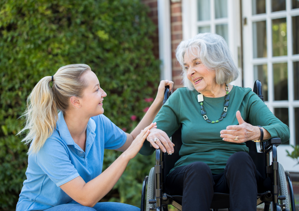 Carer with lady in wheelchair